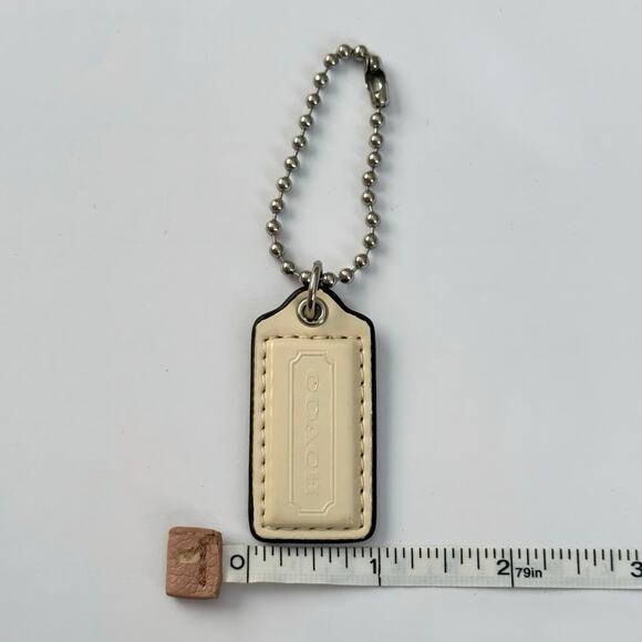Coach ivory patent leather key fob bag charm hangtag silver-tone hardware 2” - Picture 5 of 5